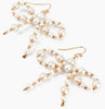 Pearl and gold beaded bow earrings 