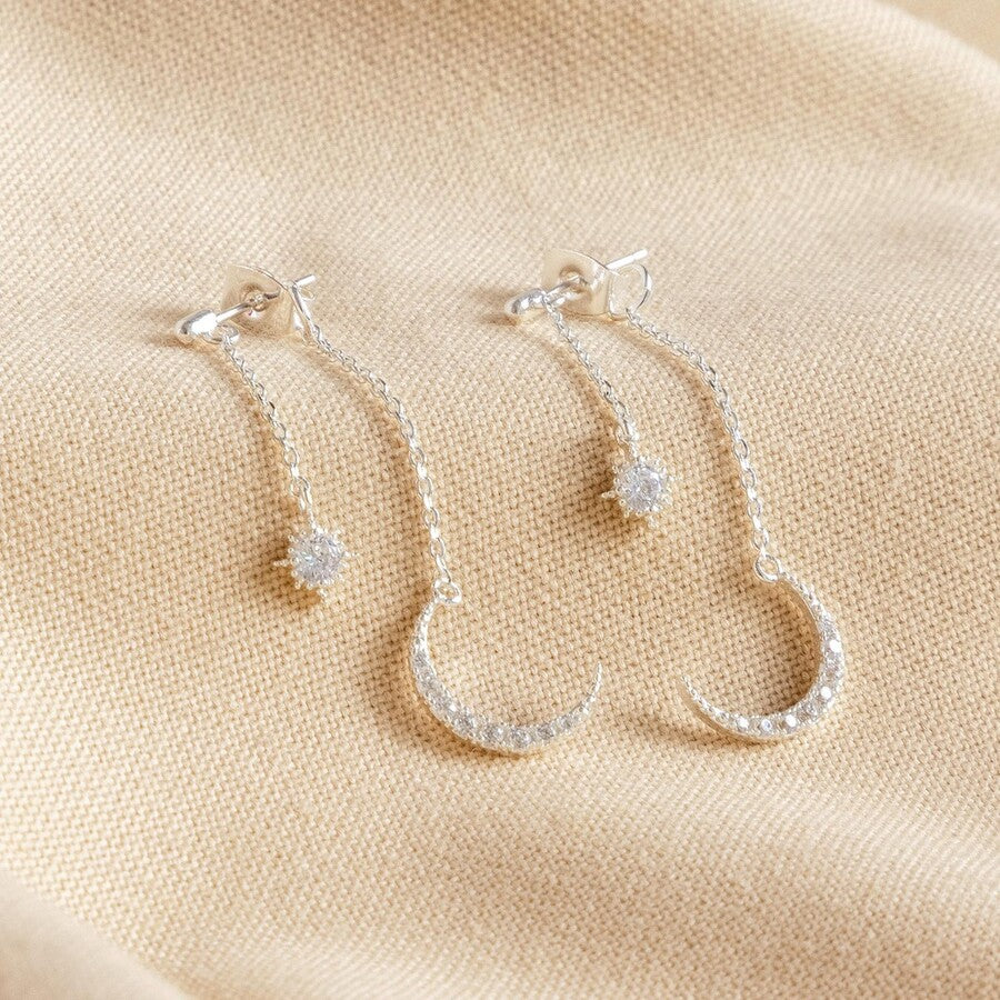 Silver star and moon earrings sales